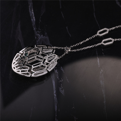 Italy Luxury Serpenti Necklace in 18K White Gold set with Emerald Eyes and with pavé diamonds on the Chain and the Head